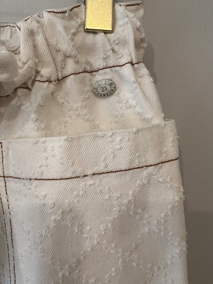 Chanel White Quilted Straight Leg Jeans with Brown Accents and Waist Ties and 31 Rue Cambon CC Logo Detail Size FR 34 (UK 6)