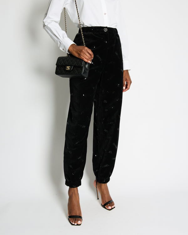 Chanel 22B Black Velvet Jogging Pants with Sequin Chanel Logo Detail Size FR 42 (UK 14)