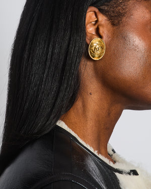 Chanel Vintage 94P Gold Polished Oval Clip On Earrings with CC Logo