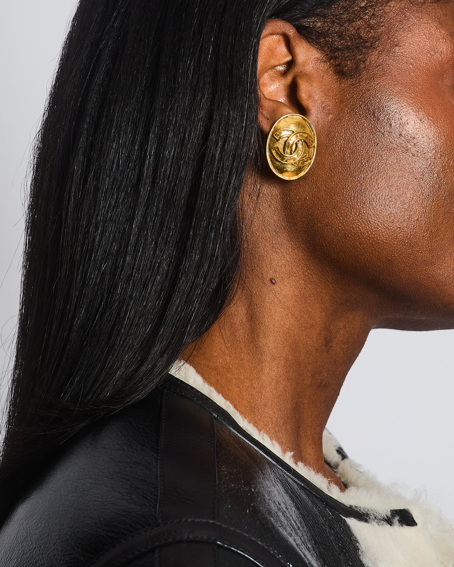 Chanel Vintage 94P Gold Polished Oval Clip On Earrings with CC Logo