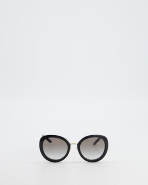 Prada Black Oval Sunglasses with Black Acetate Frames and Gradient Lenses