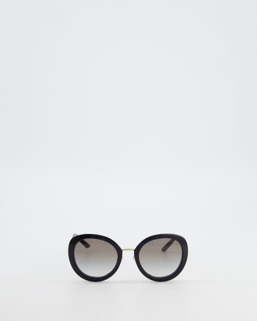 Prada Black Oval Sunglasses with Black Acetate Frames and Gradient Lenses