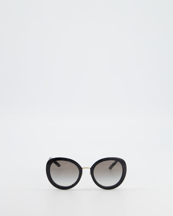 Prada Black Oval Sunglasses with Black Acetate Frames and Gradient Lenses
