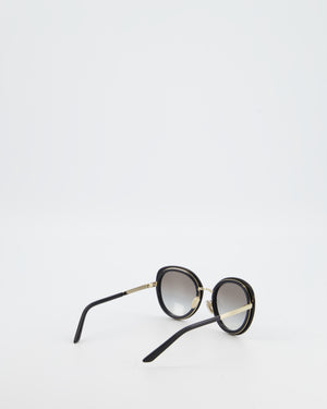 Prada Black Oval Sunglasses with Black Acetate Frames and Gradient Lenses