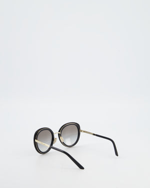 Prada Black Oval Sunglasses with Black Acetate Frames and Gradient Lenses