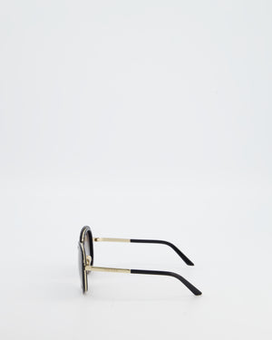 Prada Black Oval Sunglasses with Black Acetate Frames and Gradient Lenses