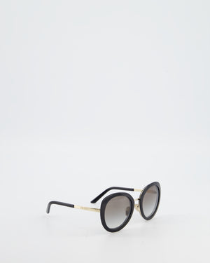 Prada Black Oval Sunglasses with Black Acetate Frames and Gradient Lenses