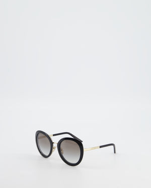 Prada Black Oval Sunglasses with Black Acetate Frames and Gradient Lenses