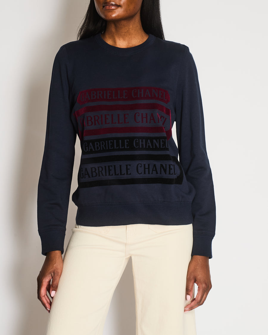 Chanel 17A Navy Crewneck Jumper with Black and Burgundy Velours Gabrielle Chanel Prints and Silver and Black CC Logo Button Detail Size FR 40 (UK 12)