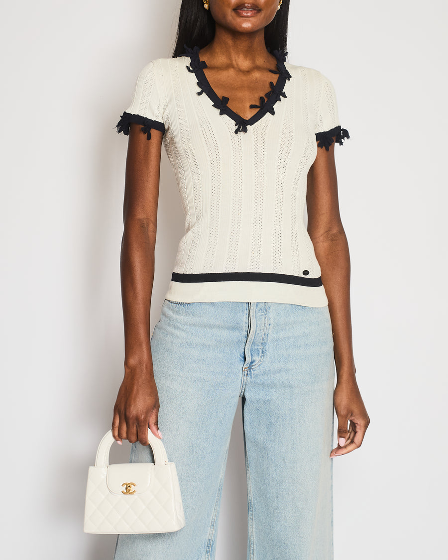 Chanel 06P White Pointelle Rib Knit Short-Sleeved Top with Navy Trims and Bow Details with Black Logo Button Size FR 36 (UK 8)