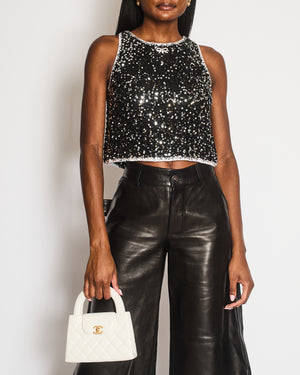 Chanel Spring 2023 Black Sleeveless Silver Sequin Embellished Crop Top with White Trims and Silver and Crystal CC Logo Bow Size FR 34 (UK 6)