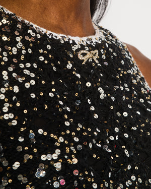 Chanel Spring 2023 Black Sleeveless Silver Sequin Embellished Crop Top with White Trims and Silver and Crystal CC Logo Bow Size FR 34 (UK 6)