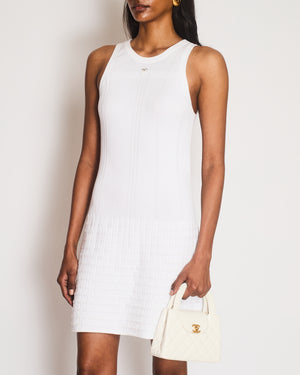 Chanel 25P White Ribbed Sleeveless Mini Dress with Textured Skirt and Silver and White CC Logo Size FR 40 (UK 12)