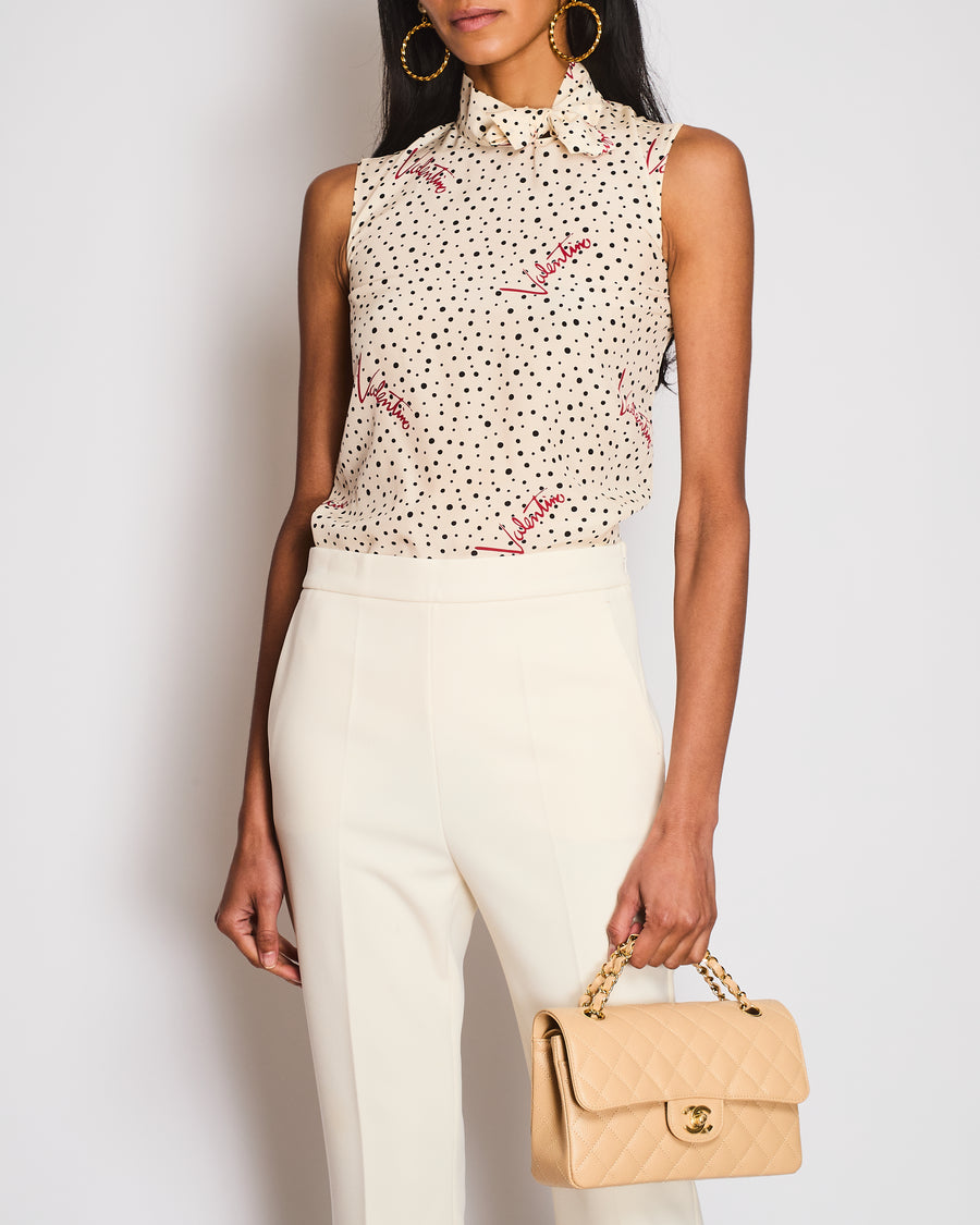 Valentino Cream Polka Dots Sleeveless Shirt With Bow Details High Neck and Red Valentino Motifs Size IT 38 (UK 6)
