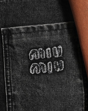 Miu Miu Black Denim Low-Rise Mini Skirt with Raw Edge Hem and Back Logo Patch Detail Size IT 42 (UK 10)