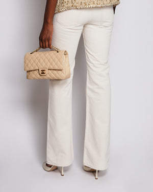 Saint Laurent 70's High-Rise Bootcut Jeans in Almond Milk Size 34 (UK 6) RRP £865