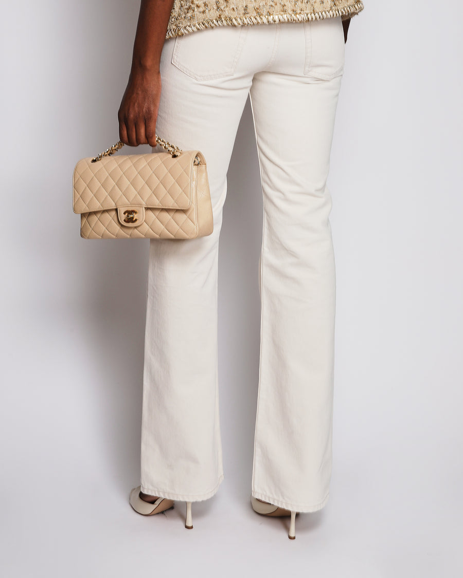 Saint Laurent 70's High-Rise Bootcut Jeans in Almond Milk Size 34 (UK 6) RRP £865