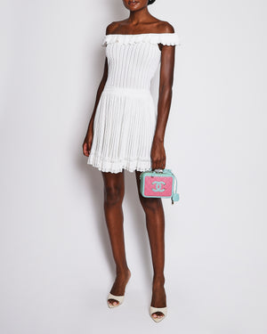 Alaïa Ivory Ribbed Knit Mini Dress with Ruffles and Pleated Skirt Details Size FR 40 (UK 12)