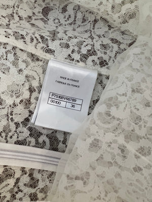 Chanel Métiers d'Art 2023 White Lace Asymmetric Midi Dress with Silver CC Logo Detail Size FR 36 (UK 8)