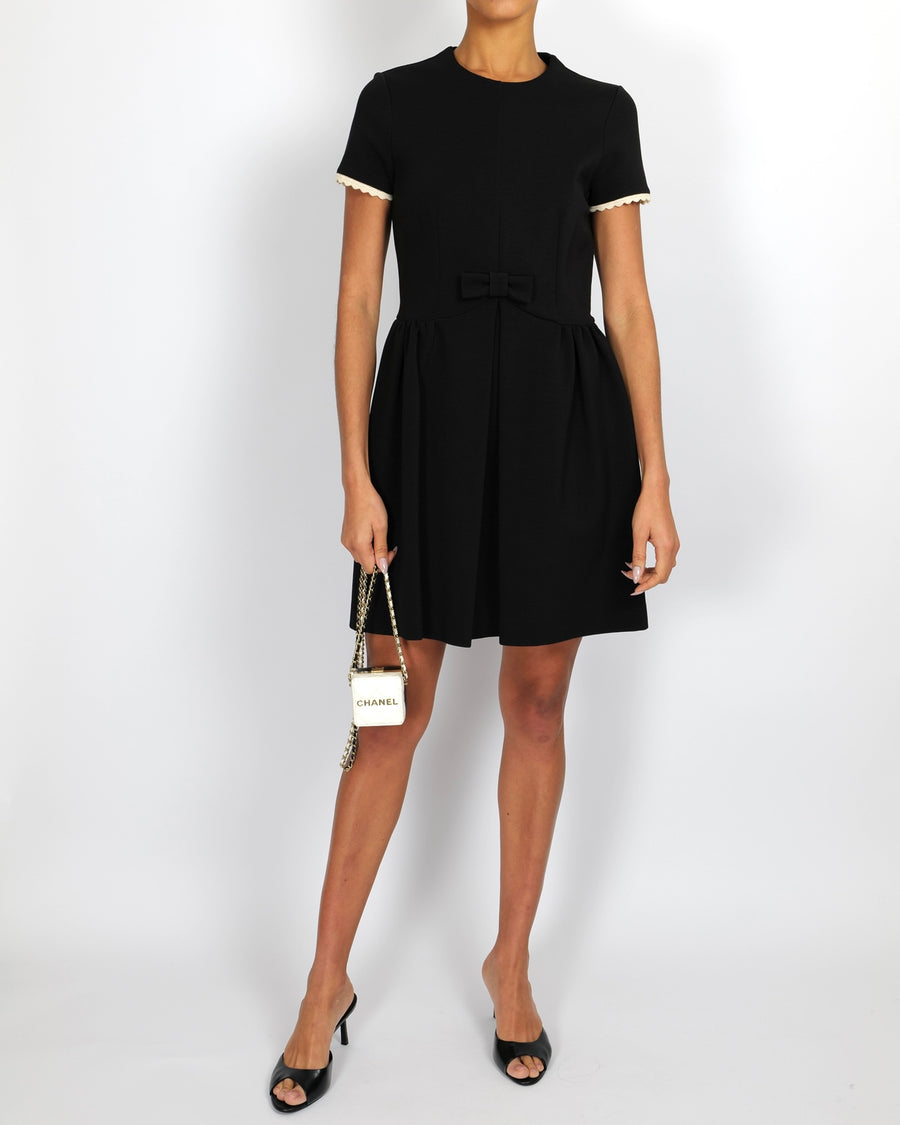 Miu Miu Black Short-Sleeved Mini Dress with White Trim and Bow Detail Sellier Miu Miu Black Short-Sleeved Mini Dress with White Trim and Bow Detail Sellier