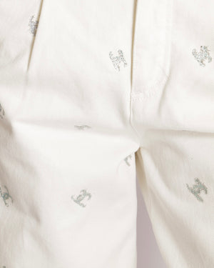 Chanel White Straight Leg High-Waisted Jeans with Turquoise, Lilac, and Silver Metallic CC Logos and Silver Button Detail Size FR 34 (UK 6)