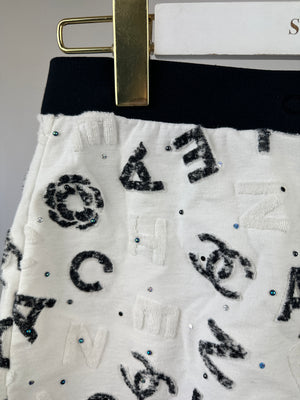 Chanel  22S White and Black Hot Pant Shorts With Logo Detail and and Gems Size M (UK 10) RRP £1,530
