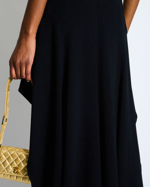 *RUNWAY* Chanel Métiers d'Art 2023 Black Front-Cropped Midi Skirt with Back Gold CC Logo Button Detail Size FR 34 (UK 6)