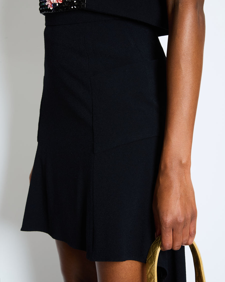 *RUNWAY* Chanel Métiers d'Art 2023 Black Front-Cropped Midi Skirt with Back Gold CC Logo Button Detail Size FR 34 (UK 6)
