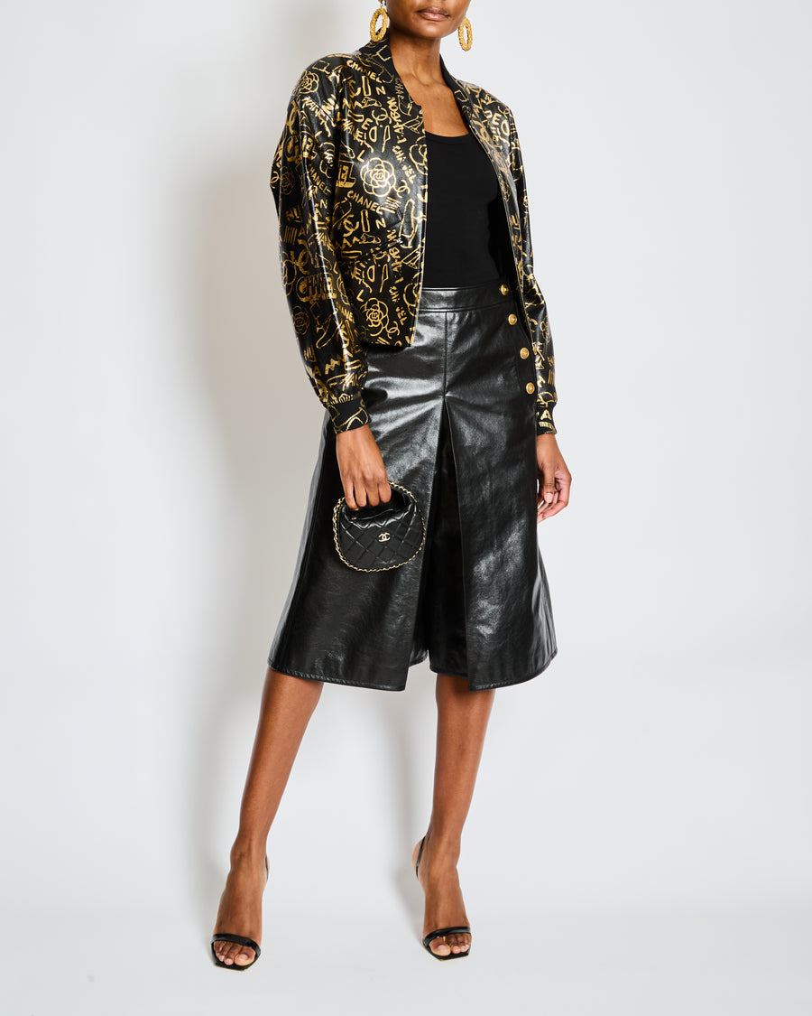 Chanel Pre-Fall 2019 Black and Gold Logo Print Graffiti Leather Bomber Jacket Size FR 34 (UK 6)