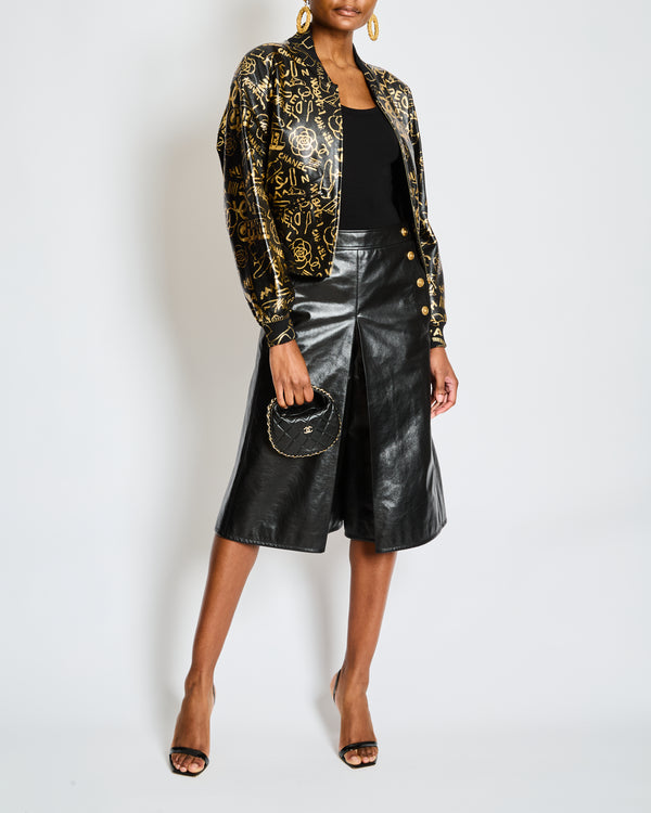 Chanel Pre-Fall 2019 Black and Gold Logo Print Graffiti Leather Bomber Jacket Size FR 34 (UK 6)