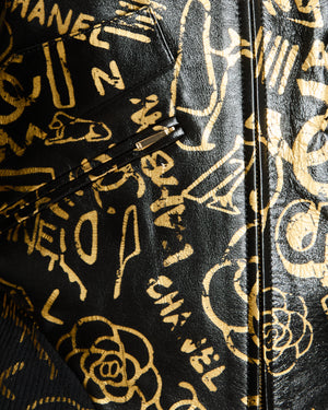 Chanel Pre-Fall 2019 Black and Gold Logo Print Graffiti Leather Bomber Jacket Size FR 34 (UK 6)