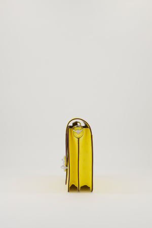 Hermès Mini Roulis 18 in Jaune Citron Ostrich Leather with Palladium Hardware