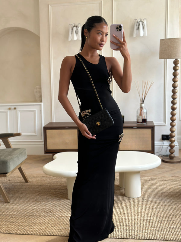 Chanel Vintage Black Small Single Flap Bag in Lambskin Leather with Round CC 24K Gold Hardware