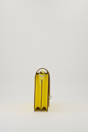 Hermès Mini Roulis 18 in Jaune Citron Ostrich Leather with Palladium Hardware