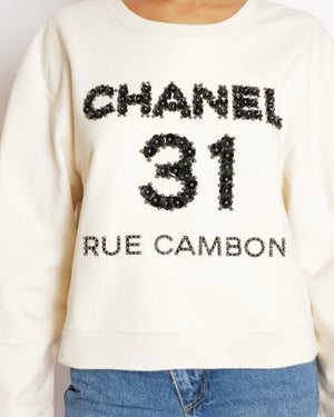 Chanel Beige 31 Rue Cambon Sweater with Black Floral Appliqué Logo Size L (UK 12)