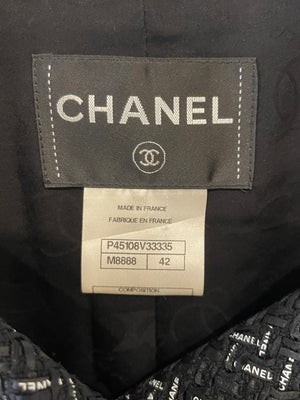 Chanel Paris Versailles Black Tweed All-Over Logo Ribbon Jacket with Silver Embellished Buttons Size FR 42 (UK 14)