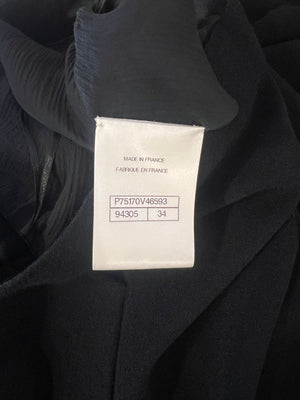 *RUNWAY* Chanel Métiers d'Art 2023 Black Front-Cropped Midi Skirt with Back Gold CC Logo Button Detail Size FR 34 (UK 6)