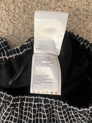 Chanel Black and White Checkered Micro Shorts with Silver Metallic Details and Silver CC Logo Buttons Size FR 36 (UK 8)