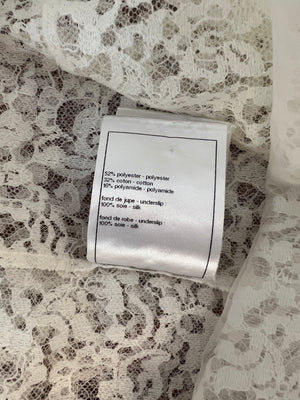 Chanel Métiers d'Art 2023 White Lace Asymmetric Midi Dress with Silver CC Logo Detail Size FR 36 (UK 8)