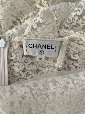 Chanel Métiers d'Art 2023 White Lace Asymmetric Midi Dress with Silver CC Logo Detail Size FR 36 (UK 8)