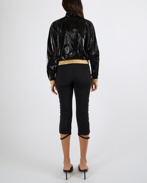 Chanel Cruise 2023 Black Shiny Bomber Jacket with Gold Trims and Zippers with Red and Gold CC Logo Button Size FR 38 (UK 10)