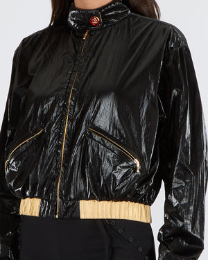 Chanel Cruise 2023 Black Shiny Bomber Jacket with Gold Trims and Zippers with Red and Gold CC Logo Button Size FR 38 (UK 10)