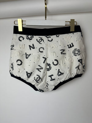 Chanel 22S White & Black Logo & Camellia Print Crop Top & Shorts Set with Black Trim & Metallic Applique Details Size S (UK 8)