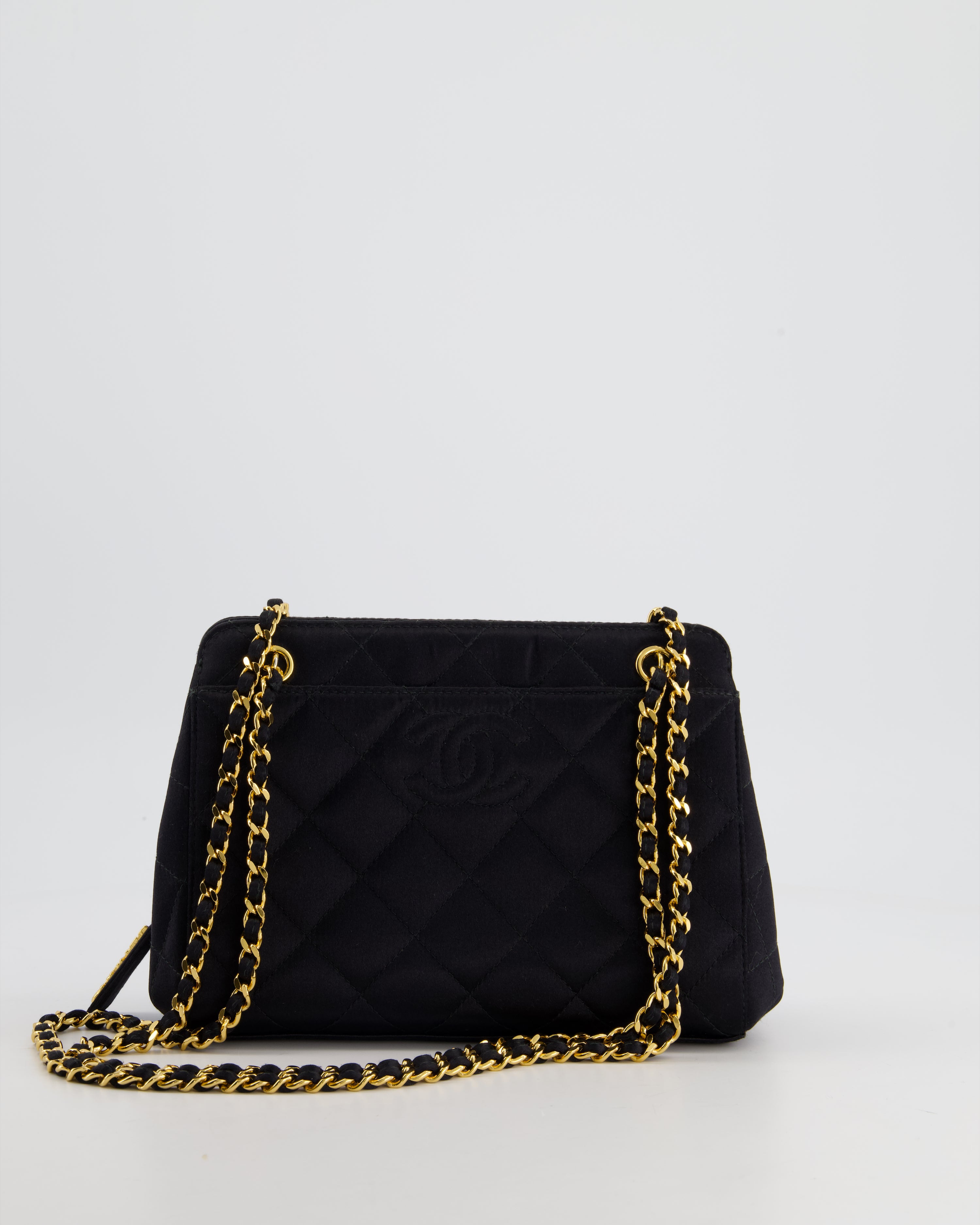 Chanel black bag with gold chain price top