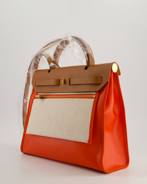 *HOT & RARE* Hermès Herbag 31 in Orange Mécano Berlin Coated Canvas, Fauve Vache Hunter Leather and Ecrù Toile H Canvas with Gold Hardware