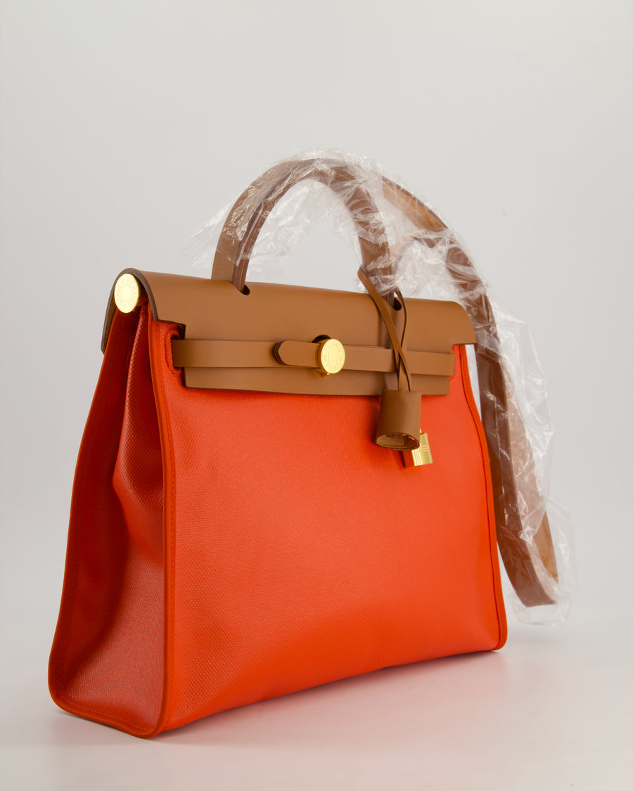 *HOT & RARE* Hermès Herbag 31 in Orange Mécano Berlin Coated Canvas, Fauve Vache Hunter Leather and Ecrù Toile H Canvas with Gold Hardware