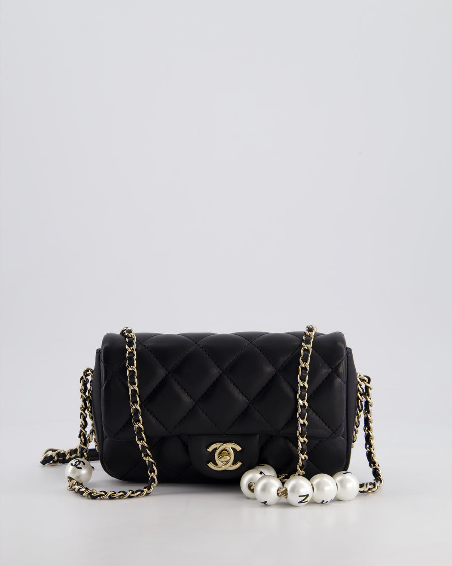Chanel Black Quilted Lambskin Small Single Flap Bag with Pearl Logo Chain Detailing and Champagne Hardware