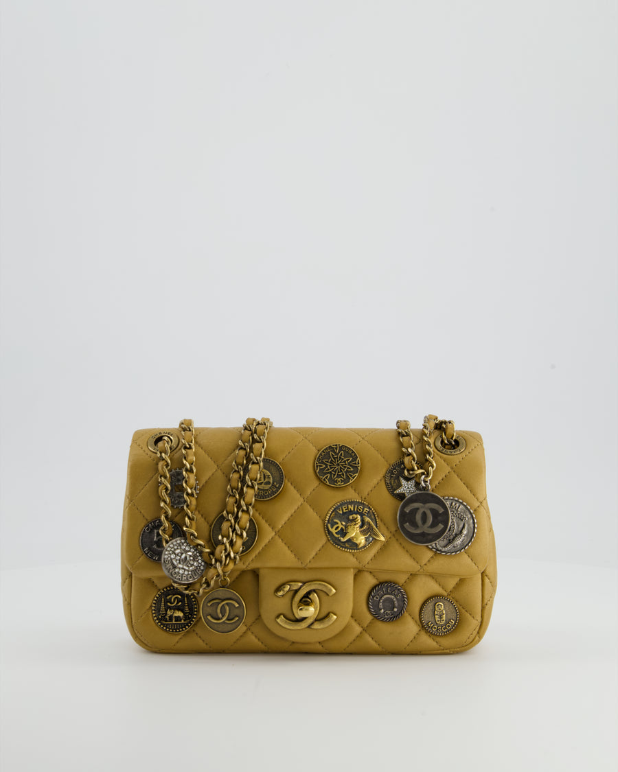 Chanel Gold Metallic Mini Single Flap Bag in Lambskin Leather Antique Gold Silver Hardware and Bronze Medallion Detail