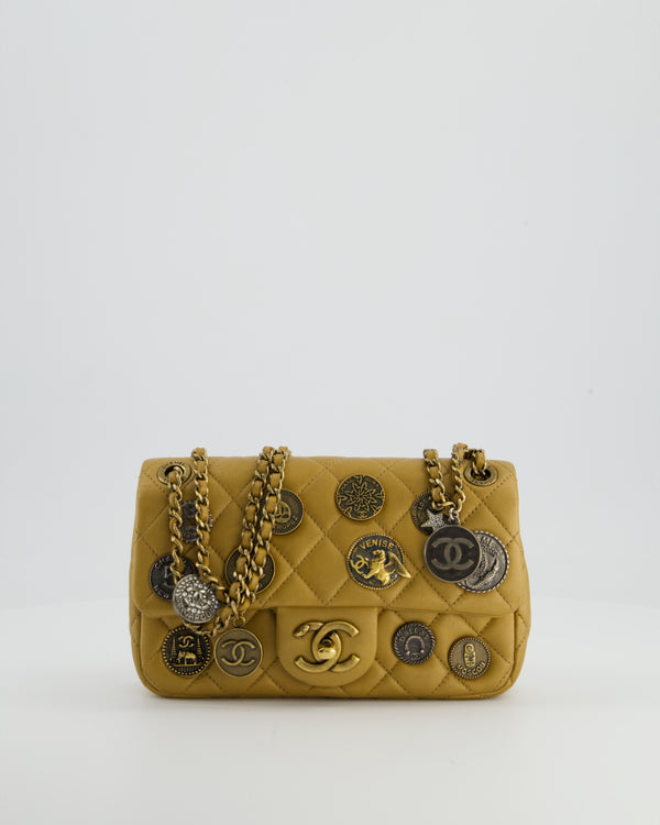 Chanel Gold Metallic Mini Single Flap Bag in Lambskin Leather Antique Gold Silver Hardware and Bronze Medallion Detail