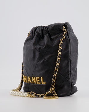 Chanel Black Mini 22 Bag in Calfskin Leather with Gold Hardware and Pearls CC Chain Detail